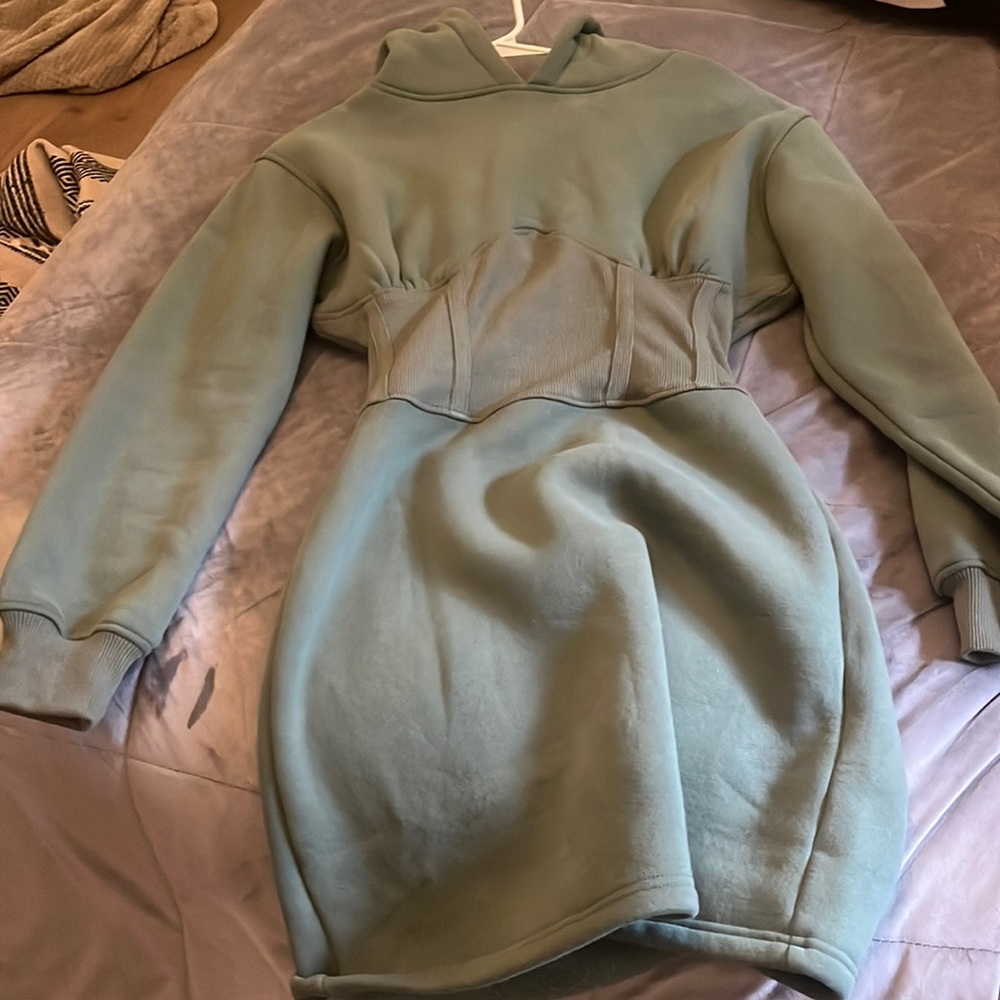 This is a dress could be aware as a long dress with leggings or jeans